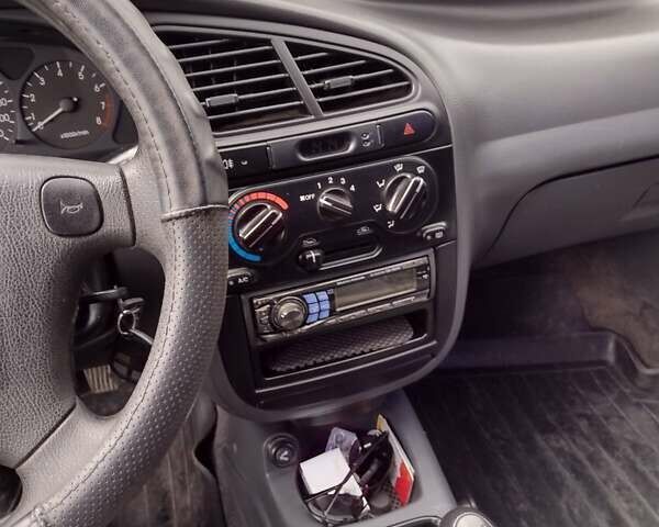 Зеленый Дэу Ланос, объемом двигателя 1.6 л и пробегом 109 тыс. км за 3400 $, фото 13 на Automoto.ua