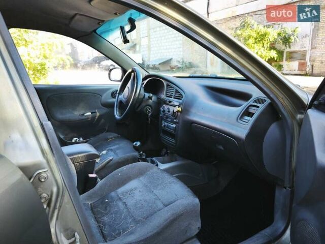 Зеленый Дэу Ланос, объемом двигателя 1.6 л и пробегом 375 тыс. км за 1800 $, фото 5 на Automoto.ua