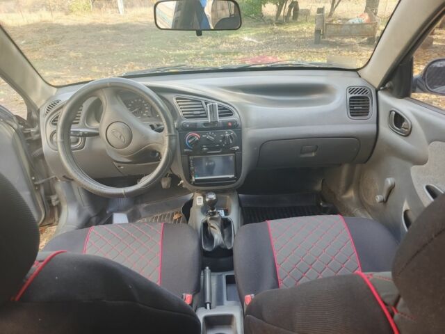 Зелений Деу Ланос, об'ємом двигуна 1.5 л та пробігом 228 тис. км за 2000 $, фото 7 на Automoto.ua