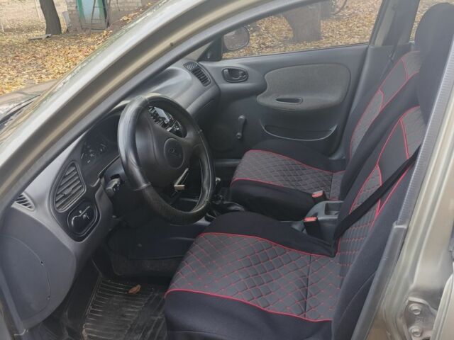 Зелений Деу Ланос, об'ємом двигуна 1.5 л та пробігом 228 тис. км за 2000 $, фото 4 на Automoto.ua