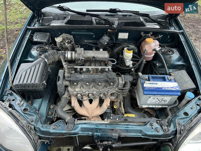 Зелений Деу Ланос, об'ємом двигуна 1.5 л та пробігом 192 тис. км за 1850 $, фото 20 на Automoto.ua