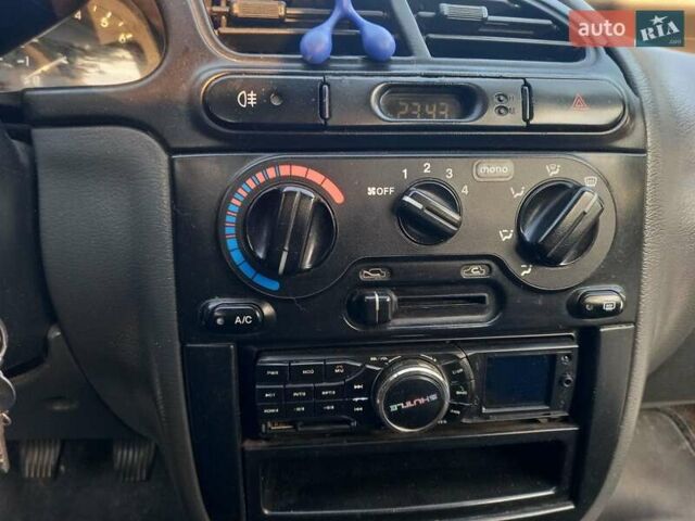 Зеленый Дэу Ланос, объемом двигателя 1.5 л и пробегом 176 тыс. км за 2199 $, фото 27 на Automoto.ua