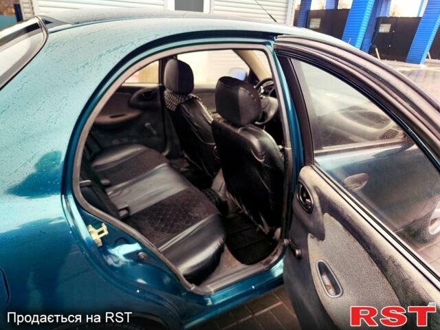 Зеленый Дэу Ланос, объемом двигателя 1.5 л и пробегом 283 тыс. км за 2200 $, фото 7 на Automoto.ua