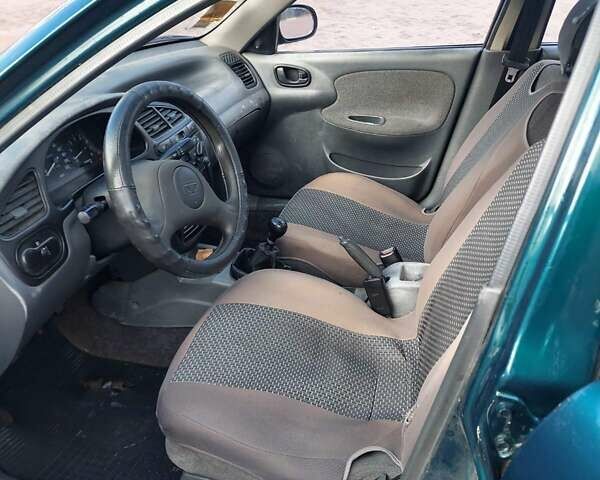 Зеленый Дэу Ланос, объемом двигателя 1.5 л и пробегом 330 тыс. км за 1300 $, фото 19 на Automoto.ua