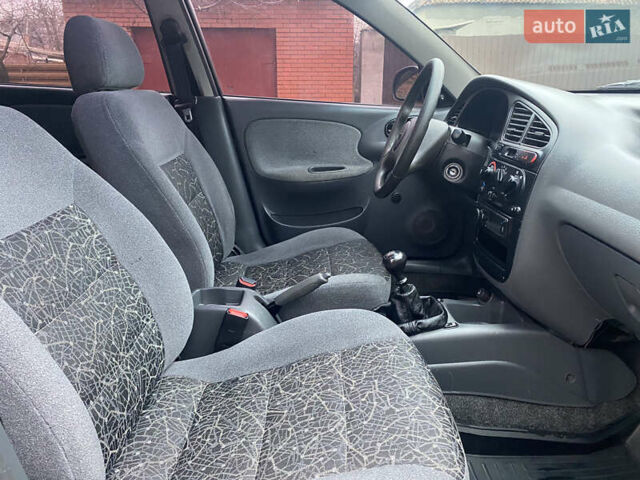 Зеленый Дэу Ланос, объемом двигателя 1.5 л и пробегом 135 тыс. км за 2800 $, фото 6 на Automoto.ua