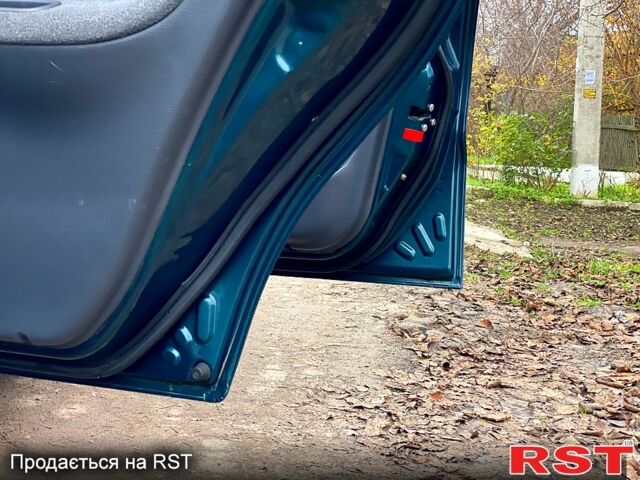 Зелений Деу Ланос, об'ємом двигуна 1.5 л та пробігом 135 тис. км за 2800 $, фото 9 на Automoto.ua