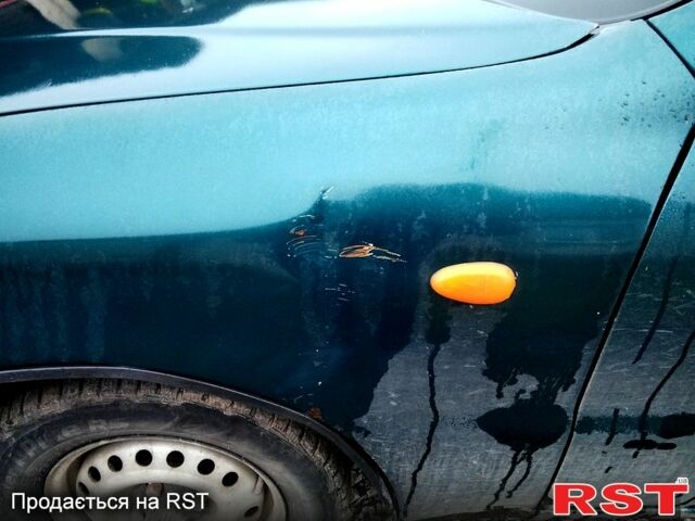 Зелений Деу Ланос, об'ємом двигуна 1.4 л та пробігом 188 тис. км за 1400 $, фото 7 на Automoto.ua