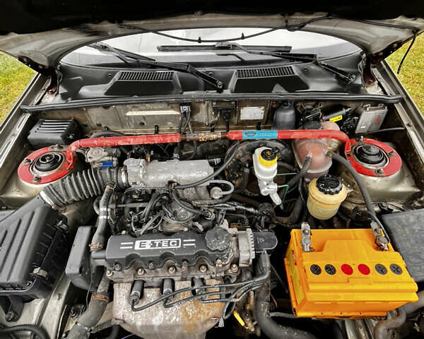 Зеленый Дэу Ланос, объемом двигателя 1.5 л и пробегом 150 тыс. км за 2000 $, фото 6 на Automoto.ua