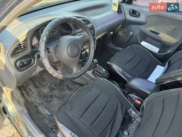 Зеленый Дэу Ланос, объемом двигателя 1.5 л и пробегом 170 тыс. км за 1900 $, фото 9 на Automoto.ua