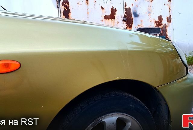 Зеленый Дэу Ланос, объемом двигателя 1.5 л и пробегом 287 тыс. км за 1200 $, фото 5 на Automoto.ua