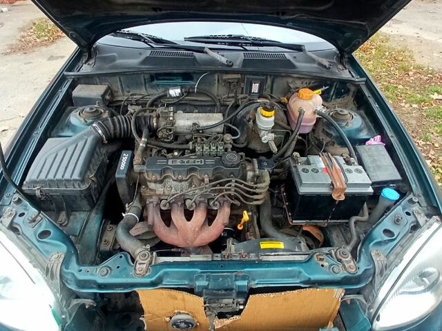 Зеленый Дэу Ланос, объемом двигателя 1.5 л и пробегом 230 тыс. км за 2250 $, фото 6 на Automoto.ua