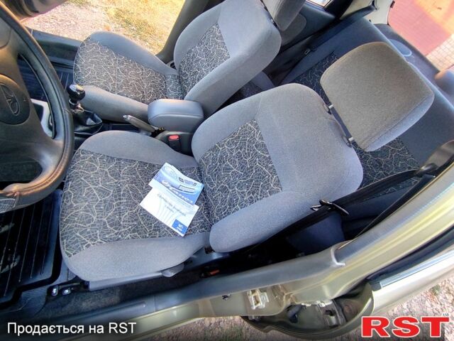 Зеленый Дэу Ланос, объемом двигателя 1.4 л и пробегом 146 тыс. км за 2200 $, фото 1 на Automoto.ua