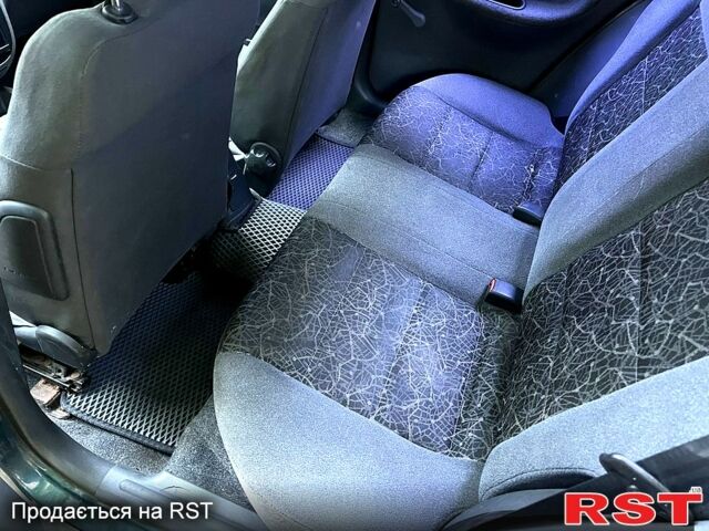 Зеленый Дэу Ланос, объемом двигателя 1.6 л и пробегом 257 тыс. км за 3300 $, фото 3 на Automoto.ua