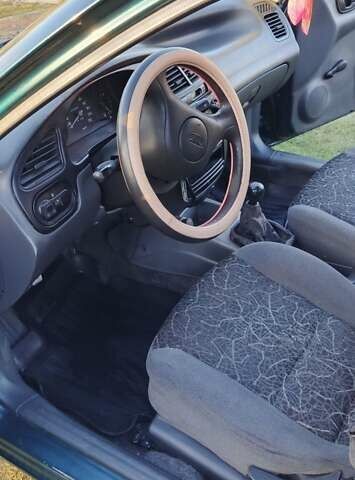 Зеленый Дэу Ланос, объемом двигателя 1.39 л и пробегом 215 тыс. км за 1800 $, фото 6 на Automoto.ua