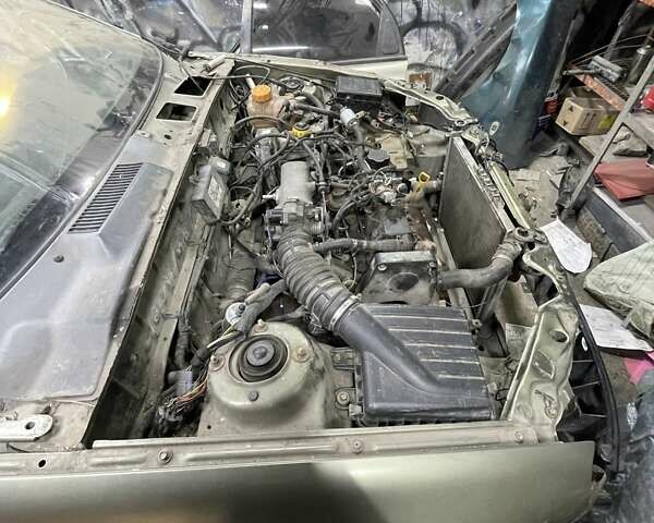 Зеленый Дэу Ланос, объемом двигателя 1.5 л и пробегом 353 тыс. км за 800 $, фото 2 на Automoto.ua