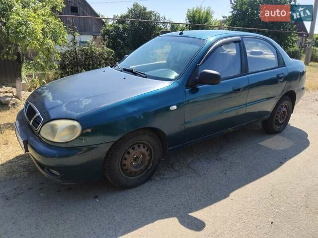 Зеленый Дэу Ланос, объемом двигателя 1.4 л и пробегом 375 тыс. км за 1200 $, фото 3 на Automoto.ua