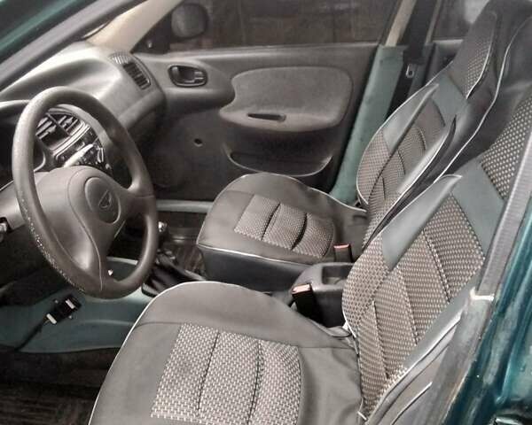 Зелений Деу Ланос, об'ємом двигуна 1.4 л та пробігом 188 тис. км за 1400 $, фото 25 на Automoto.ua
