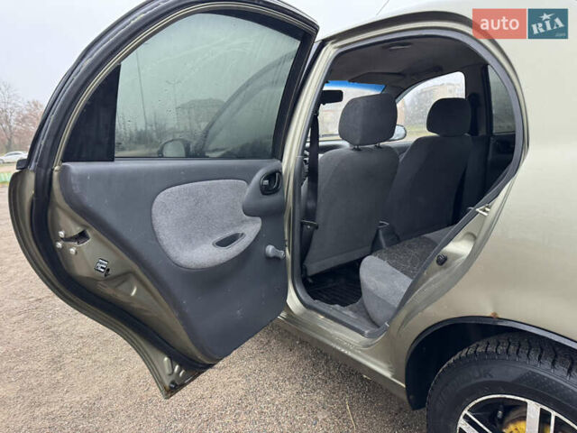 Зелений Деу Ланос, об'ємом двигуна 1.39 л та пробігом 196 тис. км за 1100 $, фото 12 на Automoto.ua