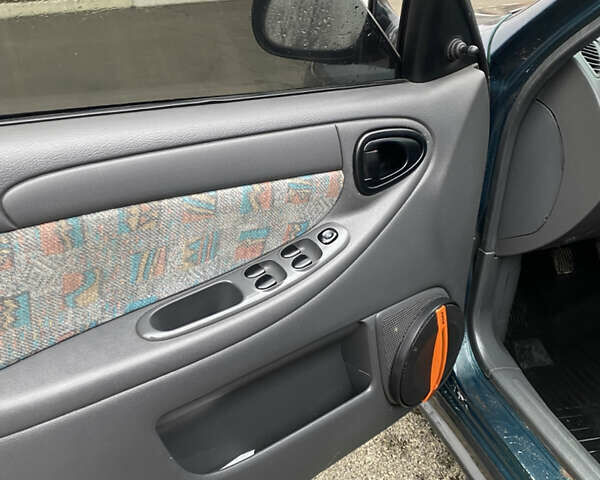 Зеленый Дэу Ланос, объемом двигателя 1.6 л и пробегом 290 тыс. км за 1499 $, фото 4 на Automoto.ua