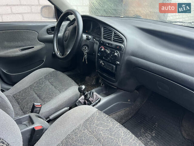 Зелений Деу Ланос, об'ємом двигуна 1.5 л та пробігом 192 тис. км за 1850 $, фото 25 на Automoto.ua