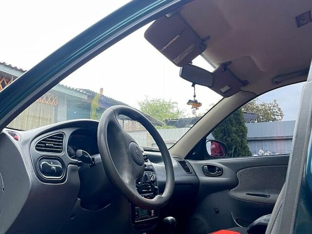 Зеленый Дэу Ланос, объемом двигателя 1.4 л и пробегом 316 тыс. км за 1200 $, фото 1 на Automoto.ua