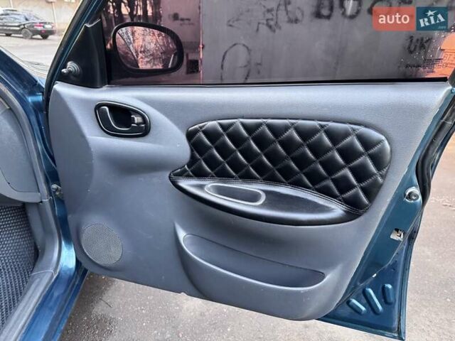 Зелений Деу Ланос, об'ємом двигуна 1.5 л та пробігом 304 тис. км за 2400 $, фото 21 на Automoto.ua