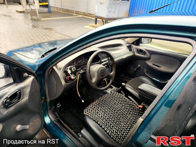 Зеленый Дэу Ланос, объемом двигателя 1.5 л и пробегом 283 тыс. км за 2200 $, фото 10 на Automoto.ua