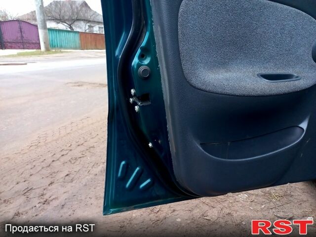 Зеленый Дэу Ланос, объемом двигателя 1.5 л и пробегом 128 тыс. км за 1750 $, фото 6 на Automoto.ua