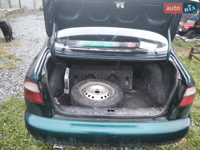 Зелений Деу Ланос, об'ємом двигуна 1.4 л та пробігом 188 тис. км за 1400 $, фото 13 на Automoto.ua