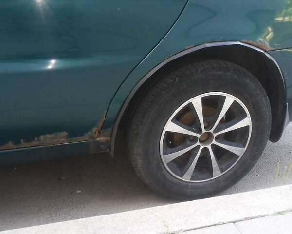 Зелений Деу Ланос, об'ємом двигуна 1.5 л та пробігом 284 тис. км за 1700 $, фото 2 на Automoto.ua