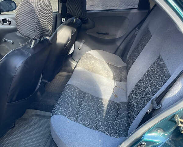 Зелений Деу Ланос, об'ємом двигуна 1.5 л та пробігом 93 тис. км за 2300 $, фото 7 на Automoto.ua