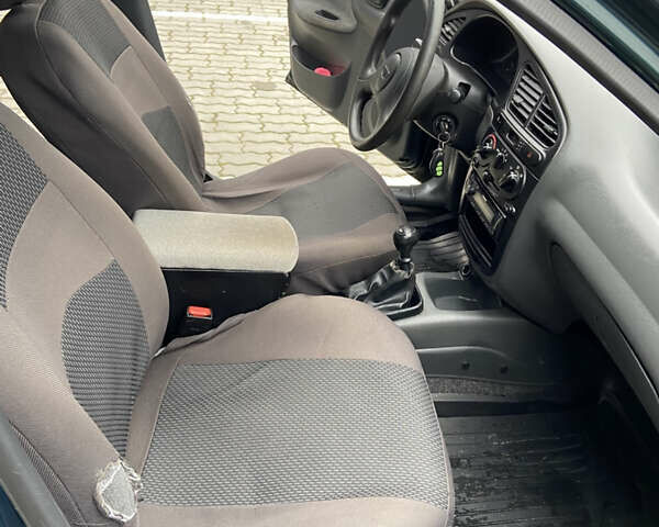 Зелений Деу Ланос, об'ємом двигуна 1.5 л та пробігом 210 тис. км за 1950 $, фото 12 на Automoto.ua