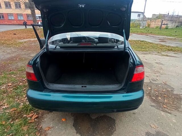 Зеленый Дэу Ланос, объемом двигателя 1.5 л и пробегом 230 тыс. км за 2250 $, фото 8 на Automoto.ua