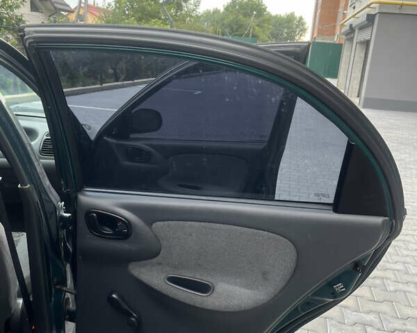 Зеленый Дэу Ланос, объемом двигателя 1.3 л и пробегом 153 тыс. км за 1500 $, фото 10 на Automoto.ua