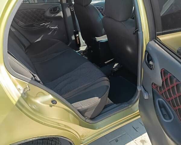 Зеленый Дэу Ланос, объемом двигателя 1.5 л и пробегом 310 тыс. км за 2500 $, фото 14 на Automoto.ua