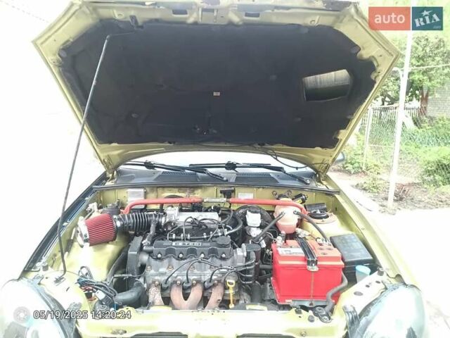 Зеленый Дэу Ланос, объемом двигателя 1.5 л и пробегом 310 тыс. км за 2500 $, фото 2 на Automoto.ua