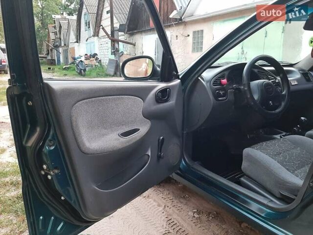 Зелений Деу Ланос, об'ємом двигуна 1.5 л та пробігом 186 тис. км за 2550 $, фото 25 на Automoto.ua