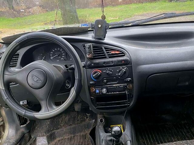 Зеленый Дэу Ланос, объемом двигателя 1.4 л и пробегом 232 тыс. км за 800 $, фото 5 на Automoto.ua