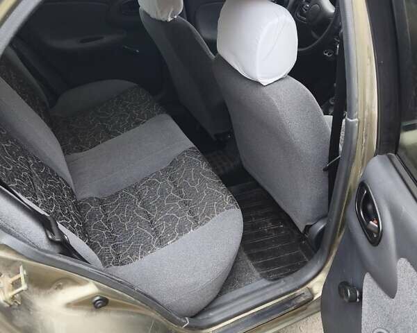 Зеленый Дэу Ланос, объемом двигателя 1.5 л и пробегом 164 тыс. км за 3200 $, фото 10 на Automoto.ua