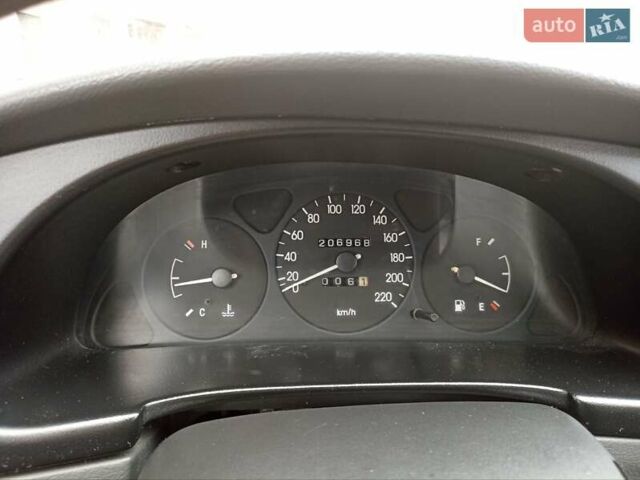 Зеленый Дэу Ланос, объемом двигателя 1.5 л и пробегом 207 тыс. км за 2450 $, фото 1 на Automoto.ua