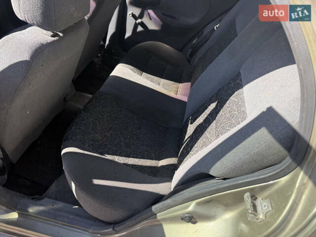 Зелений Деу Ланос, об'ємом двигуна 1.4 л та пробігом 555 тис. км за 875 $, фото 12 на Automoto.ua