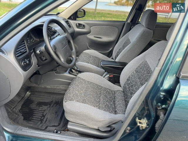 Деу Ланос 2007 у Черкасах на Automoto.ua Зелений Деу Ланос, об'ємом двигуна 1.6 л та пробігом 97 тис. км за 2950 $, фото 13 на Automoto.ua