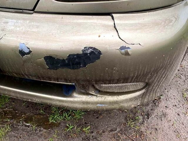 Зеленый Дэу Ланос, объемом двигателя 1.4 л и пробегом 232 тыс. км за 800 $, фото 2 на Automoto.ua