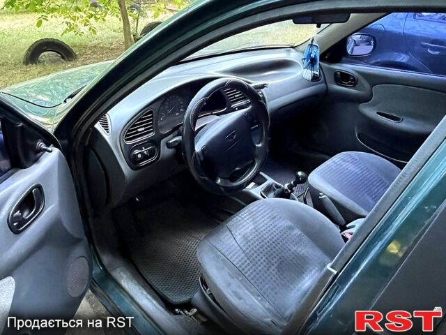 Зеленый Дэу Ланос, объемом двигателя 1.6 л и пробегом 257 тыс. км за 3300 $, фото 2 на Automoto.ua