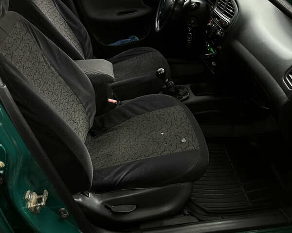 Зеленый Дэу Ланос, объемом двигателя 1.5 л и пробегом 220 тыс. км за 2300 $, фото 10 на Automoto.ua