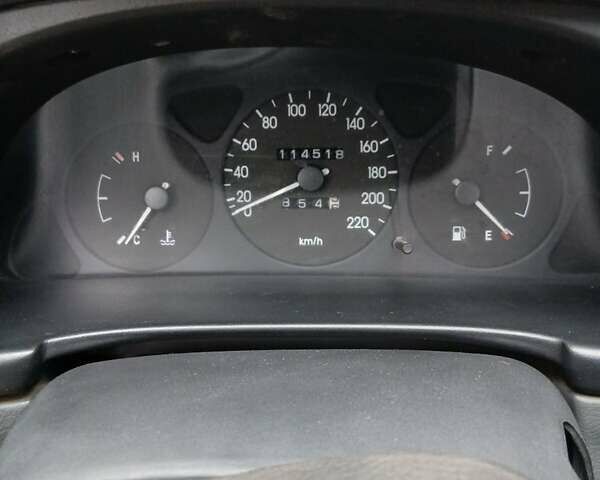 Зеленый Дэу Ланос, объемом двигателя 1.4 л и пробегом 114 тыс. км за 2200 $, фото 5 на Automoto.ua