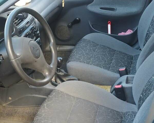 Зеленый Дэу Ланос, объемом двигателя 1.5 л и пробегом 136 тыс. км за 2200 $, фото 8 на Automoto.ua