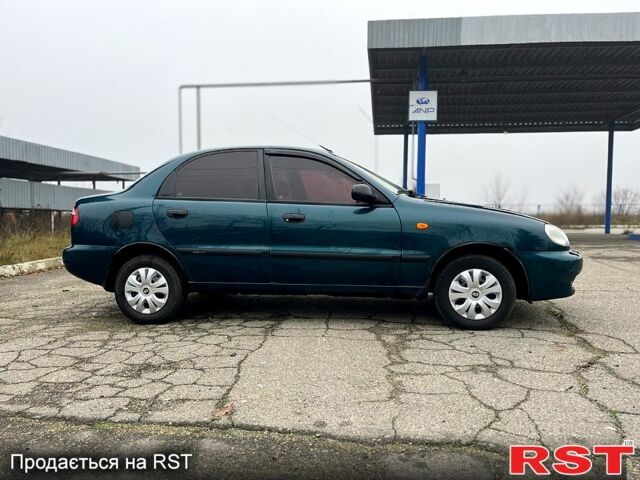 Зеленый Дэу Ланос, объемом двигателя 1.4 л и пробегом 214 тыс. км за 1999 $, фото 3 на Automoto.ua