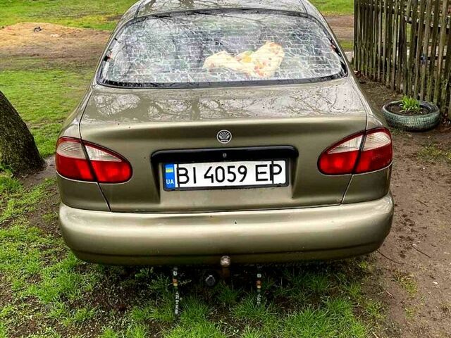 Зеленый Дэу Ланос, объемом двигателя 1.4 л и пробегом 232 тыс. км за 800 $, фото 3 на Automoto.ua