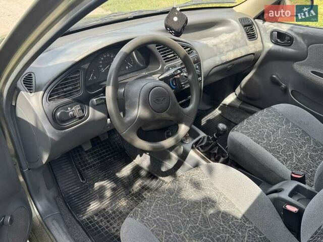 Зеленый Дэу Ланос, объемом двигателя 1.5 л и пробегом 232 тыс. км за 2650 $, фото 7 на Automoto.ua